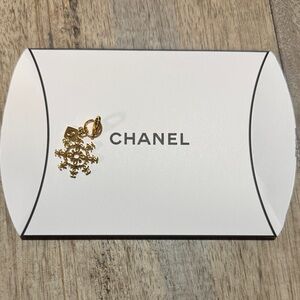 CHANEL Gold Snowflake charm w/ gift box